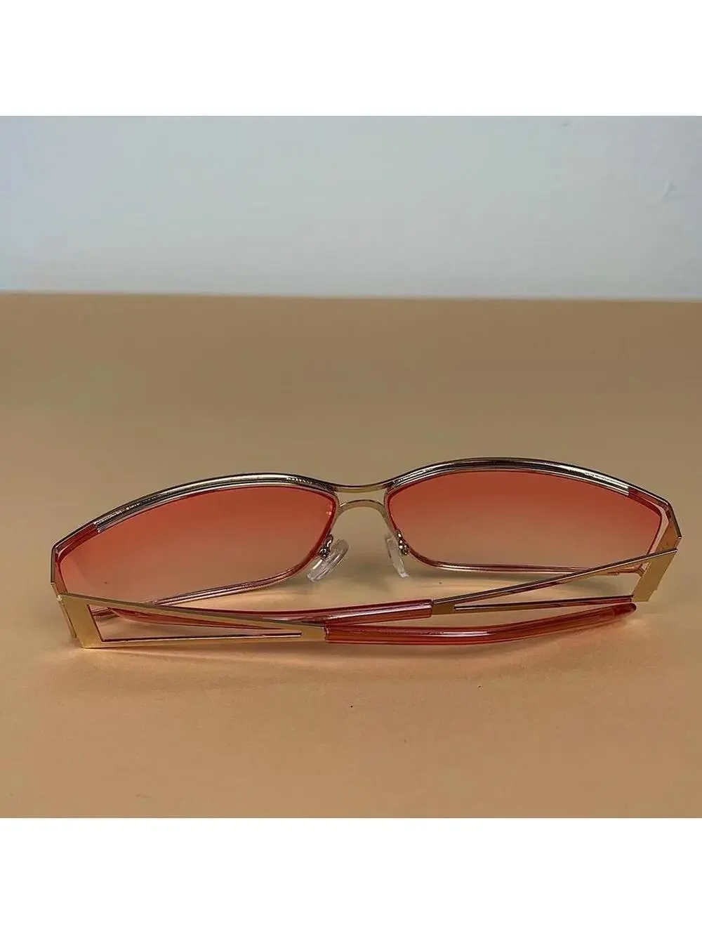 Vintage y2k 2000s classy pink chrome trim sunglasses. Chrome trim pink lenses